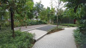 Ein Garten an der Unterkunft Agile Milestone service suite TRX by KL