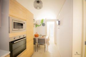 Kuchyň nebo kuchyňský kout v ubytování RC Apartment