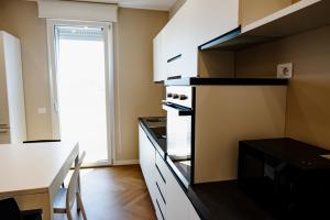 Kuchyň nebo kuchyňský kout v ubytování T&L-Home