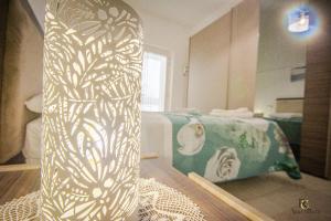 Postel nebo postele na pokoji v ubytování RC Apartment