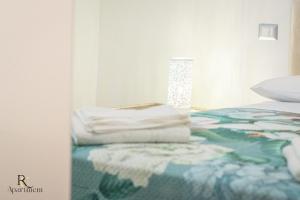 Postel nebo postele na pokoji v ubytování RC Apartment