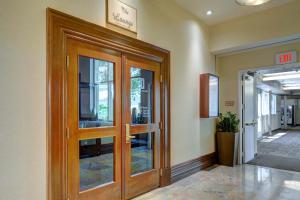 an entrance to a building with wooden doors at MGM Signature-03-611 Strip View Jacuzzi Studio in Las Vegas