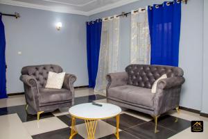 Χώρος καθιστικού στο Chambre privée dans appart à Bafoussam Diengdam proche agence BlueBird