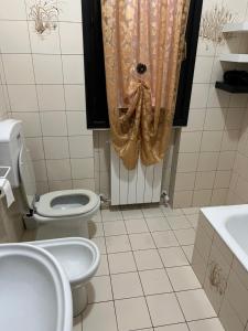 Koupelna v ubytování Al glicine + 23 fotografií