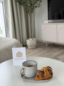 TV a/nebo společenská místnost v ubytování GOLD Apartment - Lotnisko Pyrzowice-Katowice