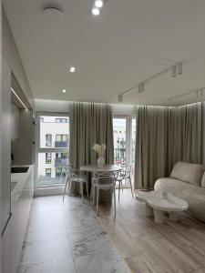 Posezení v ubytování GOLD Apartment - Lotnisko Pyrzowice-Katowice