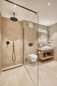 Koupelna v ubytování Das Refugium Mountain Apartment Ötztal - Längenfeld + 17 fotografií