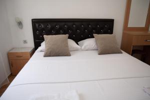 apartmani DENI客房内的一张或多张床位