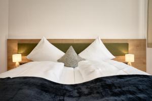 Postel nebo postele na pokoji v ubytování Das Refugium Mountain Apartment Ötztal - Längenfeld