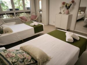 Posteľ alebo postele v izbe v ubytovaní family apartment near of beach