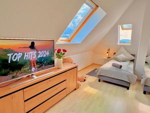 Ένα ή περισσότερα κρεβάτια σε δωμάτιο στο Panorama Studio im Schwarzwald +29 φωτογραφίες