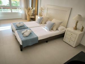 Posteľ alebo postele v izbe v ubytovaní family apartment near of beach