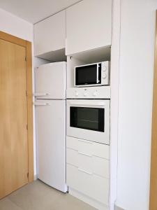 Kuchyňa alebo kuchynka v ubytovaní family apartment near of beach