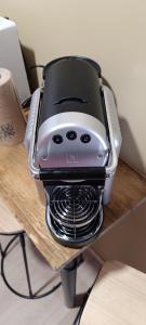 a toaster sitting on top of a table at Villa Fiorenza - Savana - Nature & Terroir in Cosne-Cours-sur-Loire +18 photos