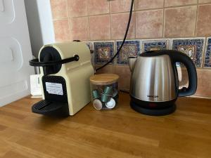 a coffee maker and a toaster on a counter at Apartmán Česká Kamenice in Česká Kamenice