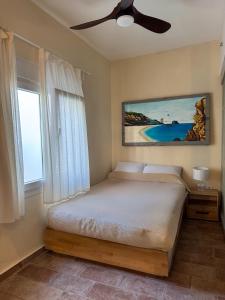 Ένα ή περισσότερα κρεβάτια σε δωμάτιο στο Overstay Pelion