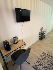 Televiisor ja/või meelelahutuskeskus majutusasutuses logement vue sur mer