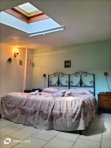 Кровать или кровати в номере Holiday Home Lago del Salto