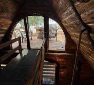 an inside view of a wooden cabin with a window at Dunavski Raj in Belgrade +64 photos