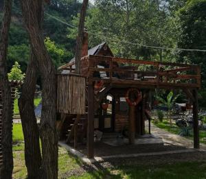 a tree house in the middle of a park at Dunavski Raj in Belgrade