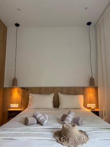 Postel nebo postele na pokoji v ubytování Lagouvardos Beach House