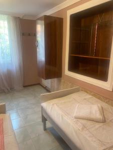 A bed or beds in a room at Vakho house
