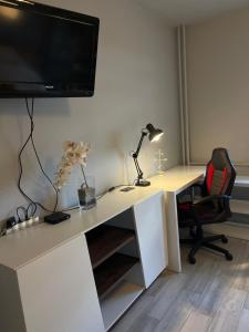 Μια τηλεόραση ή/και κέντρο ψυχαγωγίας στο Apartamento Estrella