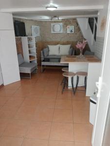 a living room with a couch and a table at La Casita in Cangas de Morrazo