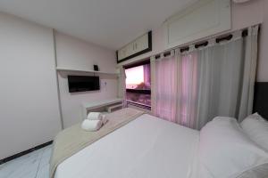 Postel nebo postele na pokoji v ubytování Ondina Apart Hotel + 37 fotografií