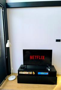 Televízia a/alebo spoločenská miestnosť v ubytovaní KASZUBSKI LOFT Sominy + 27 fotografií