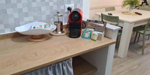 a table with a hair dryer on top of it at La Casetta al Poggio in Valentano
