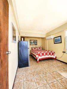 Postel nebo postele na pokoji v ubytování Casa Robinson Guest House
