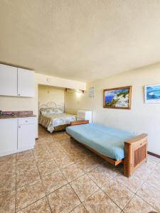 Postel nebo postele na pokoji v ubytování Casa Robinson Guest House