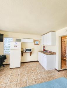 Kuchyň nebo kuchyňský kout v ubytování Casa Robinson Guest House