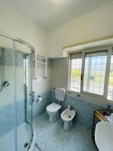 Koupelna v ubytování A casa di Alessio + 20 fotografií