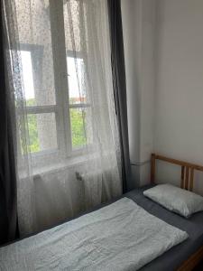 Posteľ alebo postele v izbe v ubytovaní Room in Old Town Krakow