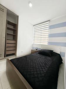 Postel nebo postele na pokoji v ubytování Apartamento punto céntrico