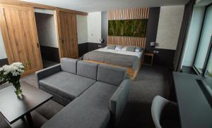 Voodi või voodid majutusasutuse Hotel Kras toas