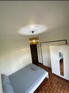 Katil atau katil-katil dalam bilik di Holidayhome