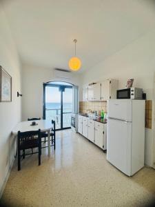 Kuchyň nebo kuchyňský kout v ubytování Sea View SAB