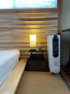 Postel nebo postele na pokoji v ubytování Tokushima - house / Vacation STAY 573