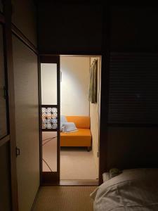 Postel nebo postele na pokoji v ubytování Tokushima - house / Vacation STAY 573