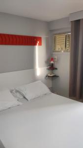 Postel nebo postele na pokoji v ubytování Boa Viagem Flat BVF 777