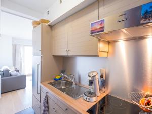 Cucina o angolo cottura di Cozy Stay by the Sea, cleaning included