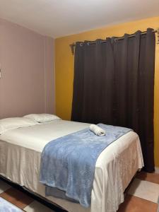 Un ou plusieurs lits dans un hébergement de l'établissement Hotel Lima Park
