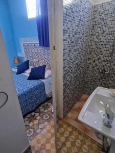 Katil atau katil-katil dalam bilik di Riad Nostalgie of Tetouan