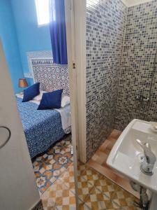 Katil atau katil-katil dalam bilik di Riad Nostalgie of Tetouan