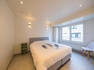 Postel nebo postele na pokoji v ubytování Apartment in Belgium with Stunning Sea View, cleaning included