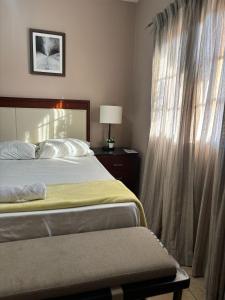 Un ou plusieurs lits dans un hébergement de l'établissement Hotel Lima Park