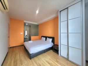 Postel nebo postele na pokoji v ubytování Roxy Hotel & Apartments